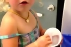 Little Girl Can't Figure Out Water Cooler