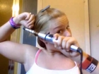 Chick burns her hair off with a curling iron