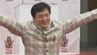 Jackie Chan leaves imprints of hands, feet and lips